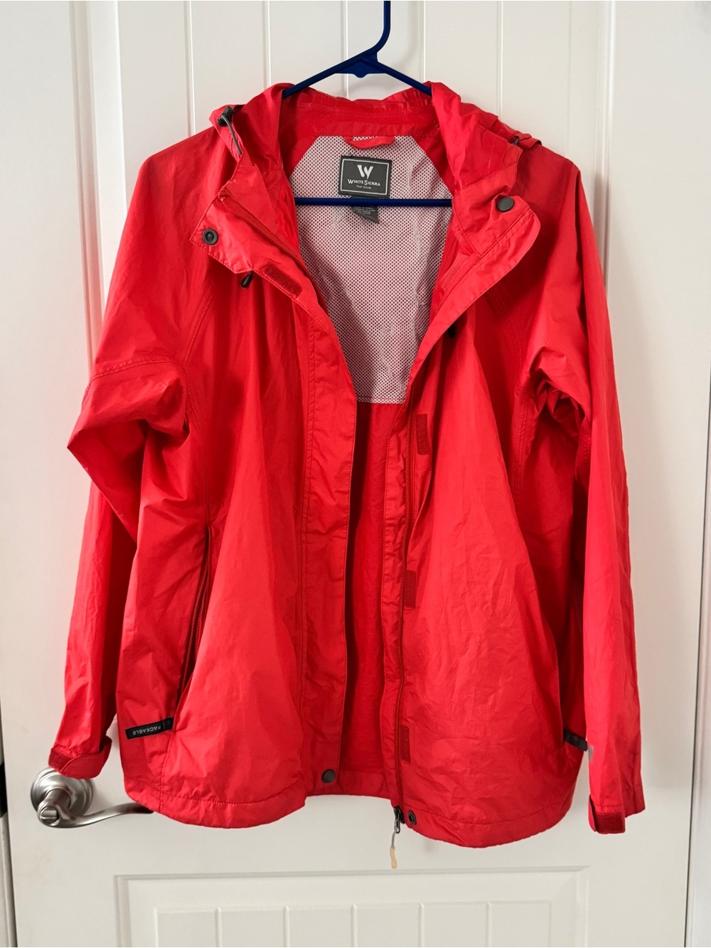 White Sierra Women's Bright Orange Hooded Rain Jacket